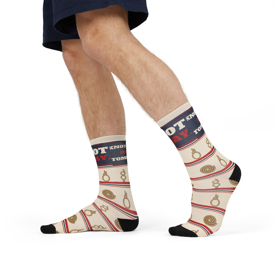 Model in denim shorts walking in Knot Today funny nautical socks with navy top band and sailor knots