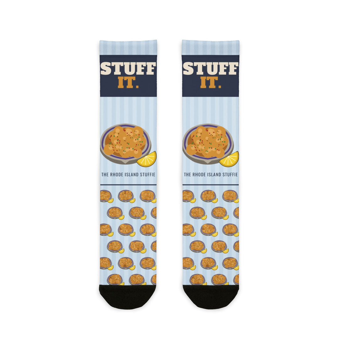 Stuff It. Rhode Island socks with a stuffed quahog and lemon and The Rhode Island Stuffie text, flat lay front