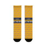 I Like My Wieners All the Way socks flat lay front, mustard yellow with hot wiener print and navy band