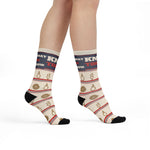 Model mid-step in cream Knot Today nautical crew socks with rope knot pattern and black toes