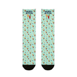 BlockBoundRI Off Duty. On Island. Block Island socks flat lay, mint green with cocktail glasses pattern