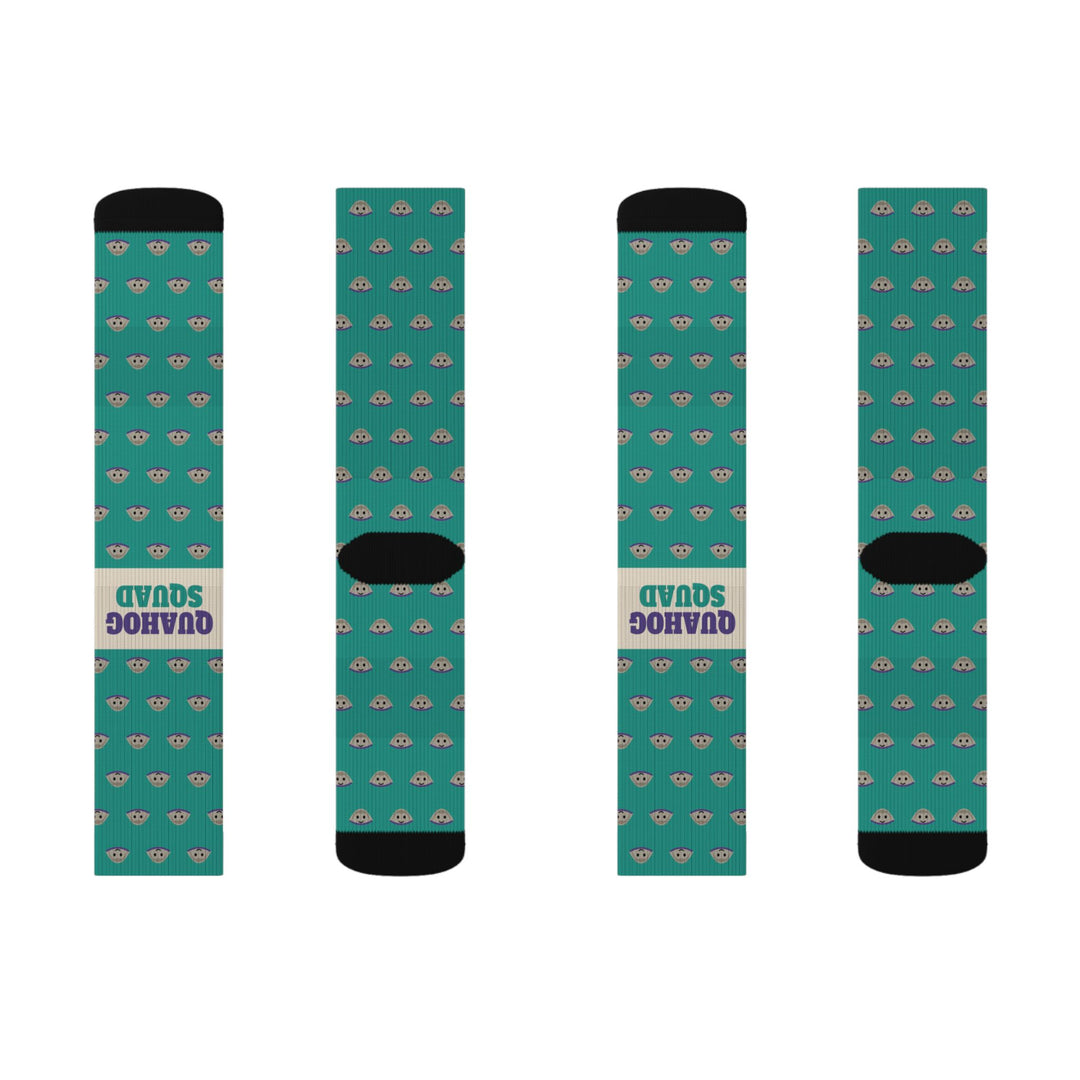 Second flat lay of four teal Quahog Squad Rhode Island socks in a row, two showing the cream Quahog Squad band