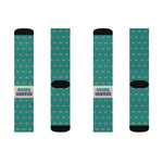 Second flat lay of four teal Quahog Squad Rhode Island socks in a row, two showing the cream Quahog Squad band