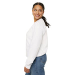 Woman glancing over her shoulder in the white One More Crossing crewneck, Block Island gift idea