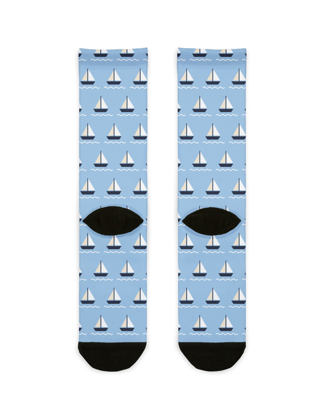 Back view of light blue sailboat socks with black heels and a repeating regatta sailboat pattern
