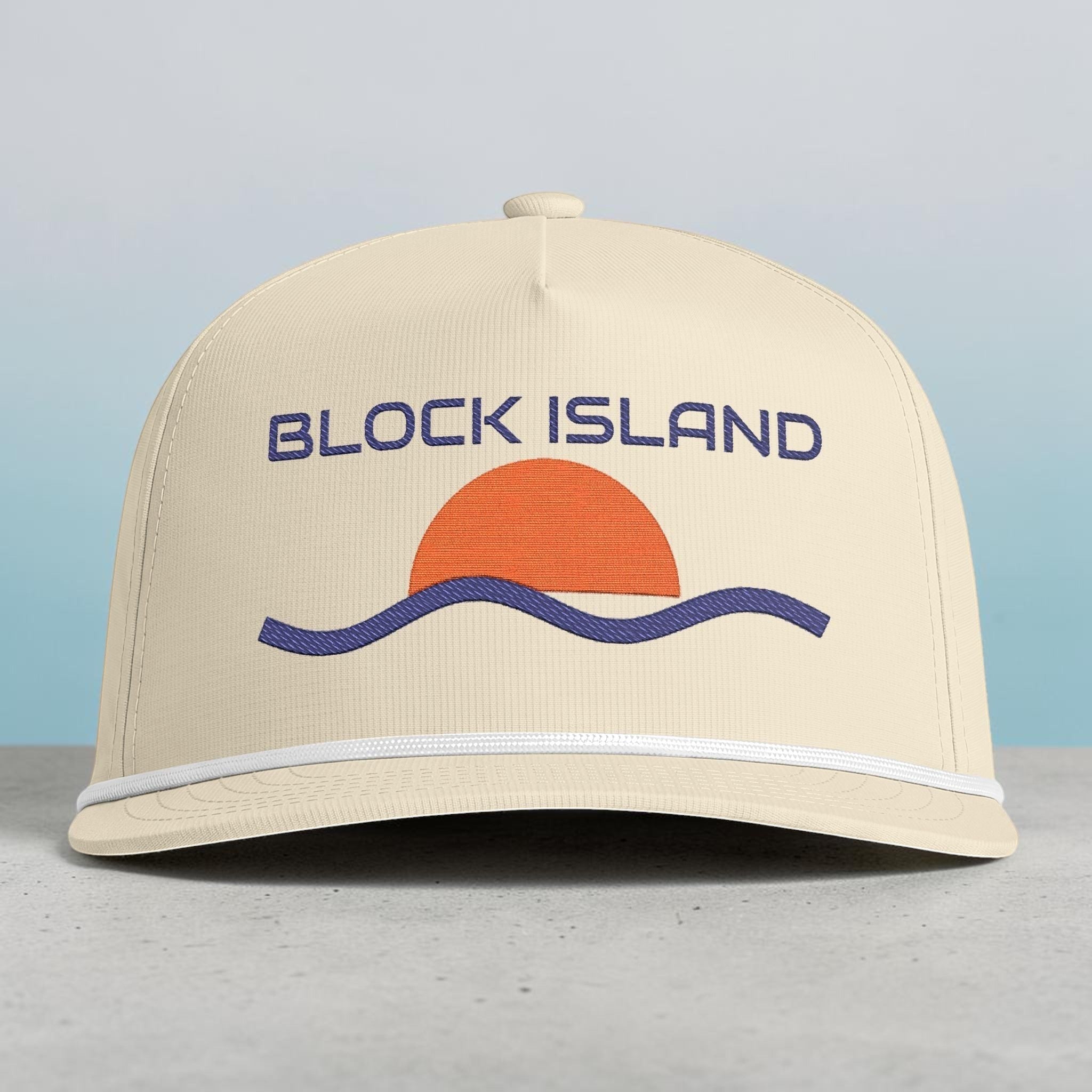 BlockBoundRI cream five-panel ripstop cap with a retro sunset and wave embroidery and decorative rope trim