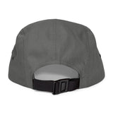 BlockBoundRI grey 5-panel cotton cap with an adjustable black nylon strap and clip closure, back view.