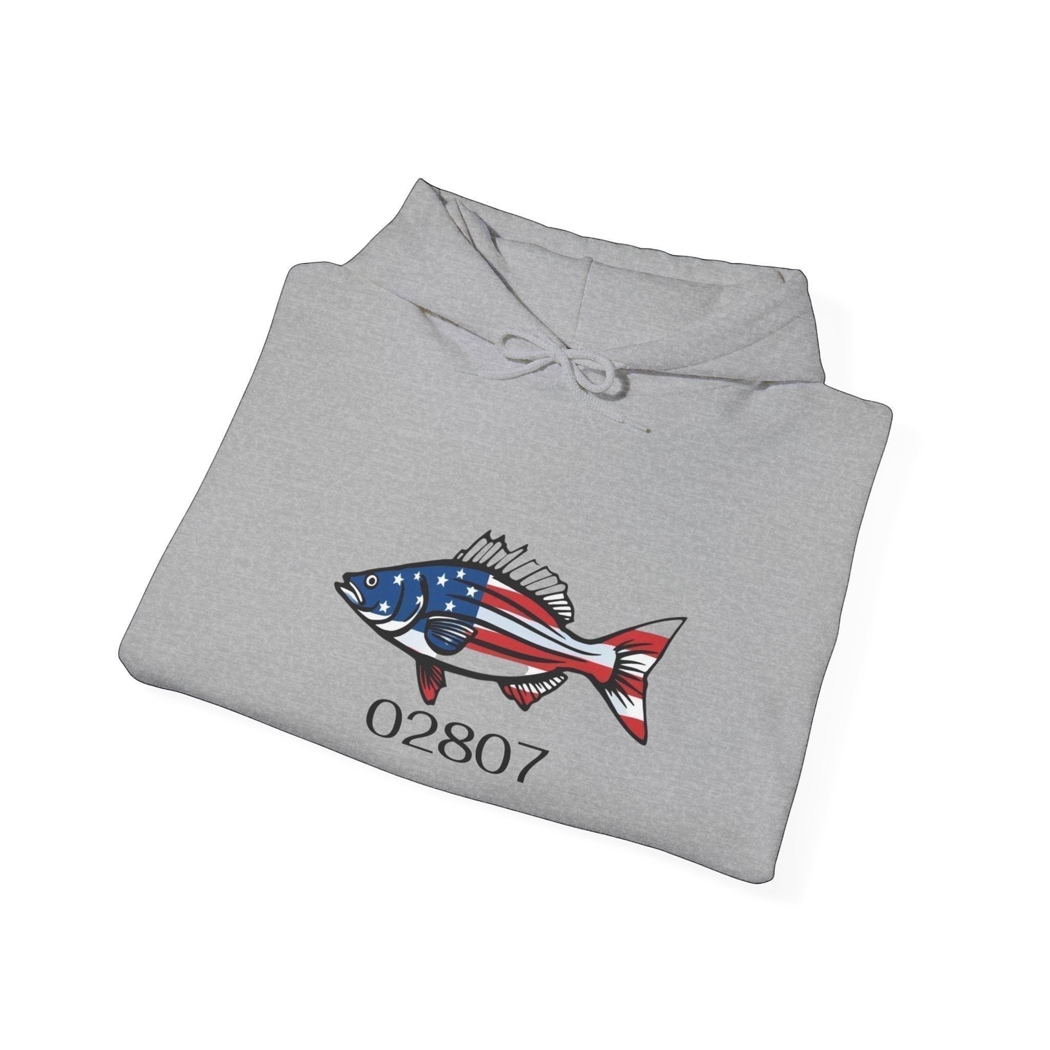 BlockBoundRI grey hooded sweatshirt featuring a hand-drawn striped bass with American flag pattern and 02807 zip code.