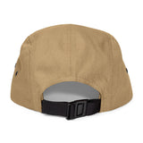 BlockBoundRI tan cotton 5-panel cap featuring an adjustable black nylon strap with a clip closure, rear view.