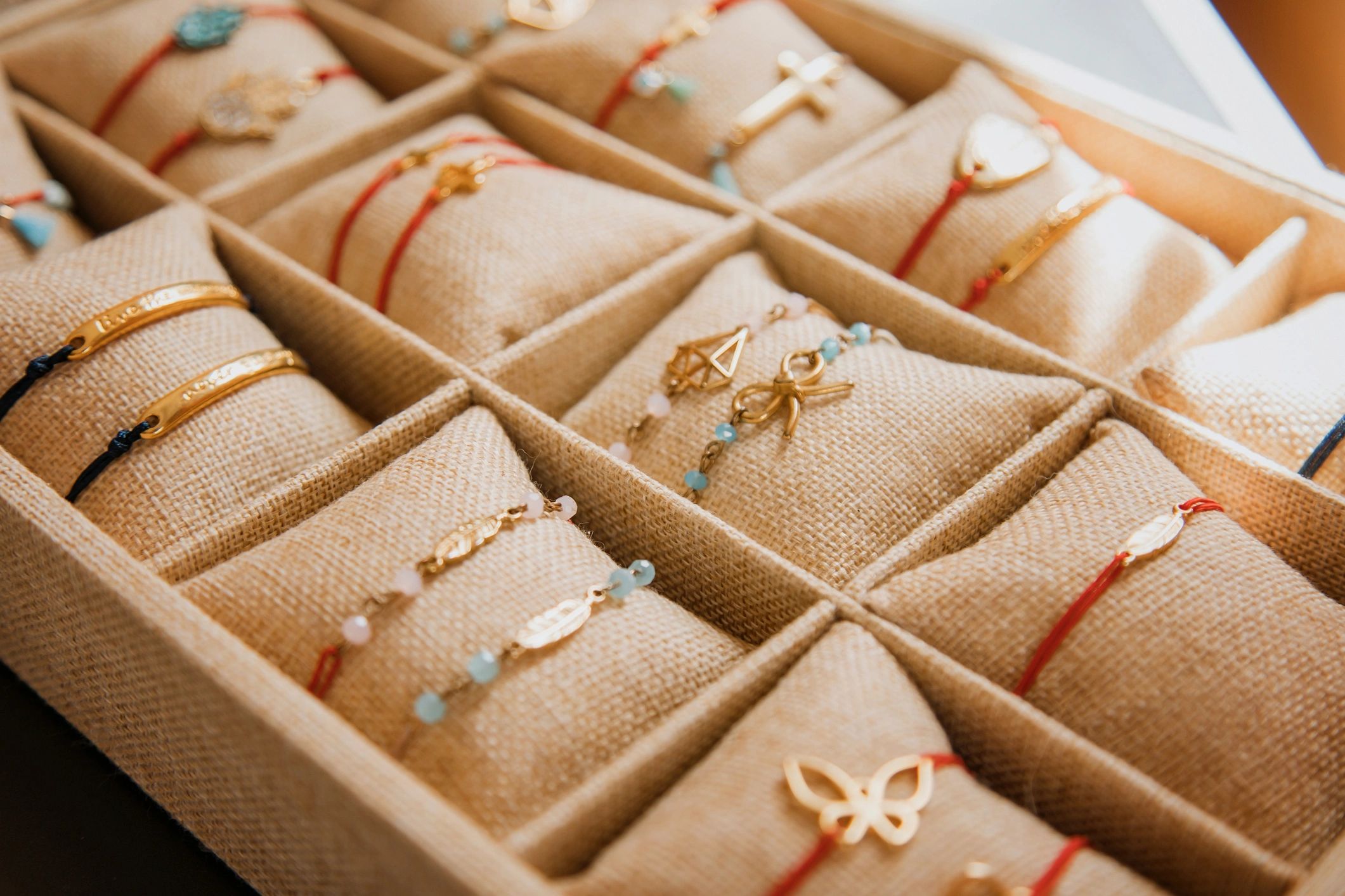 Handmade bracelets displayed in a row