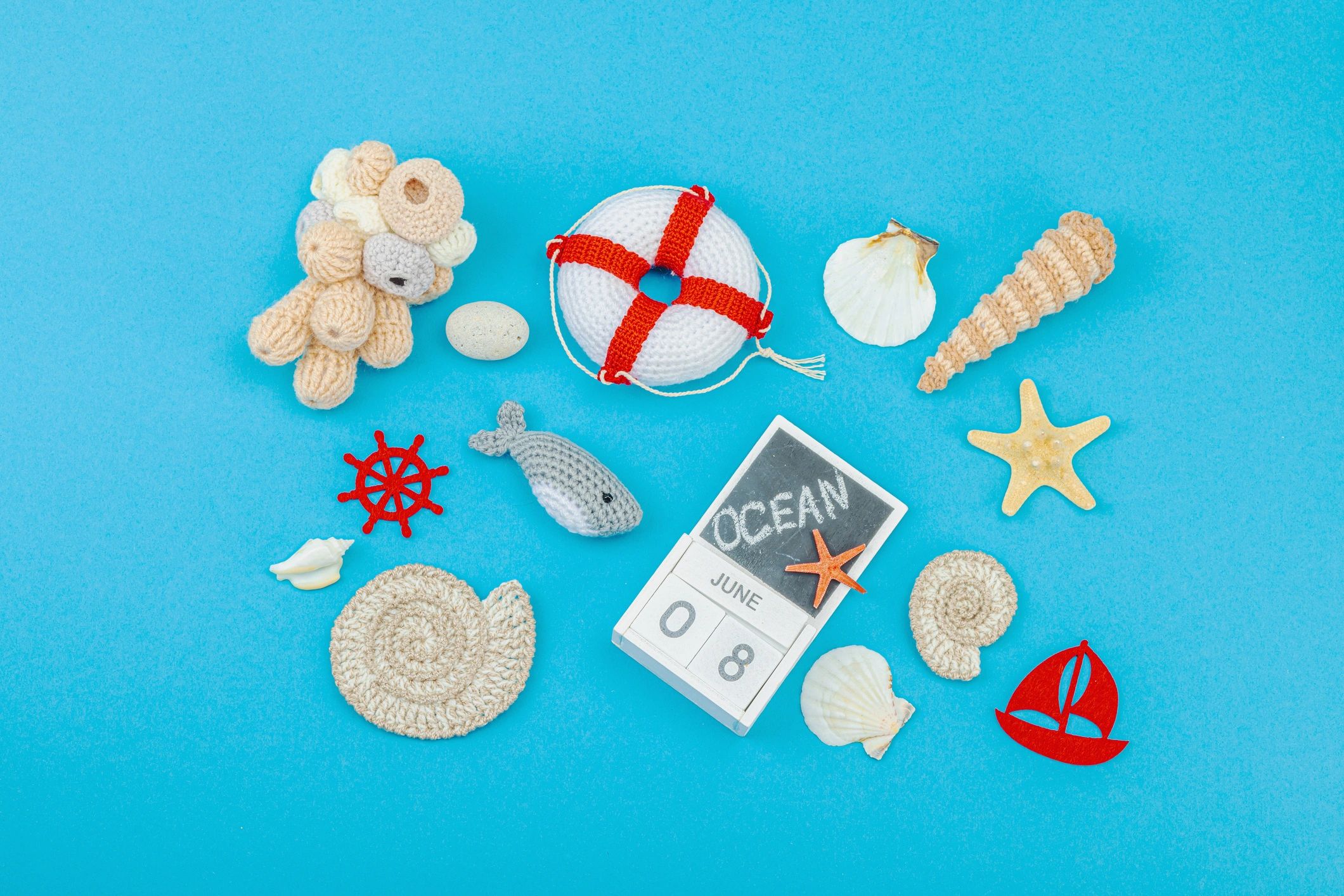 Giftable coastal items arranged in a nautical flat lay